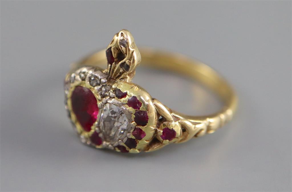A 19th century 18ct gold, foil backed garnet? and diamond set twin hearts ring,